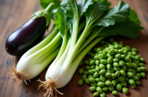 Assortiment de legumes frais commençant par E sur une table en bois